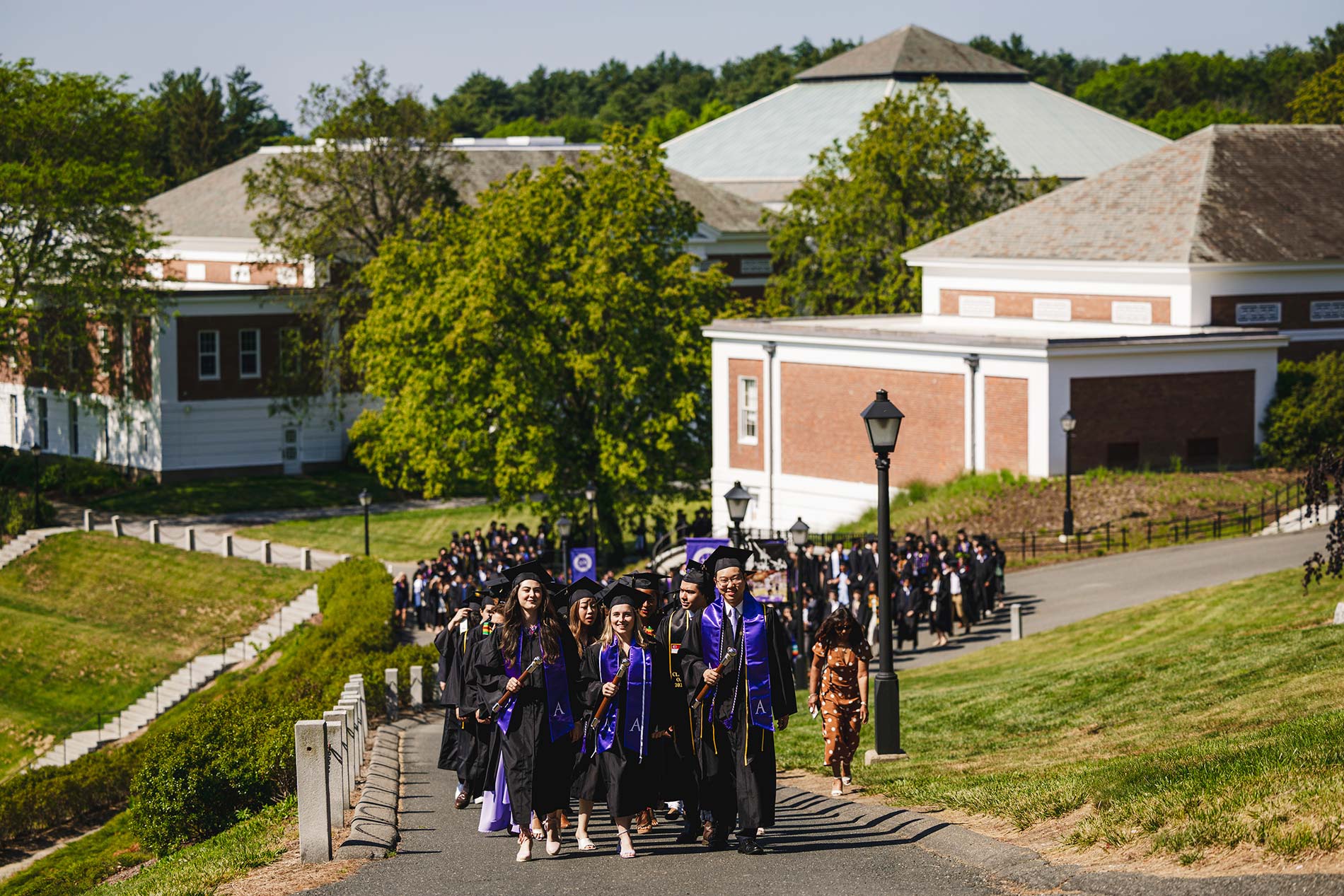 The students processing from the Alumni Gym to the Academic Quad.