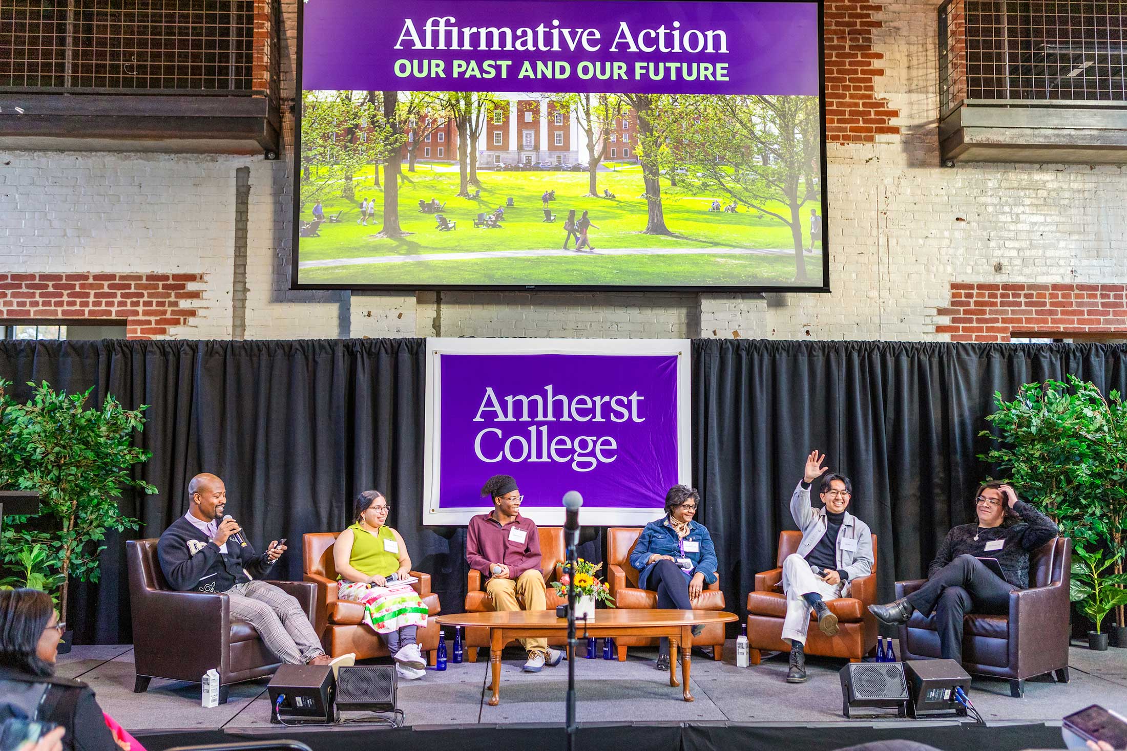 Affirmative action panelists speaking to students, faculty, staff and alumni at Amherst College.