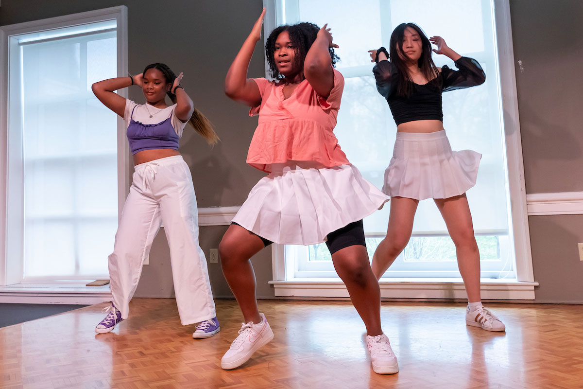 Three student dancers perform during Admitted Student Open House.